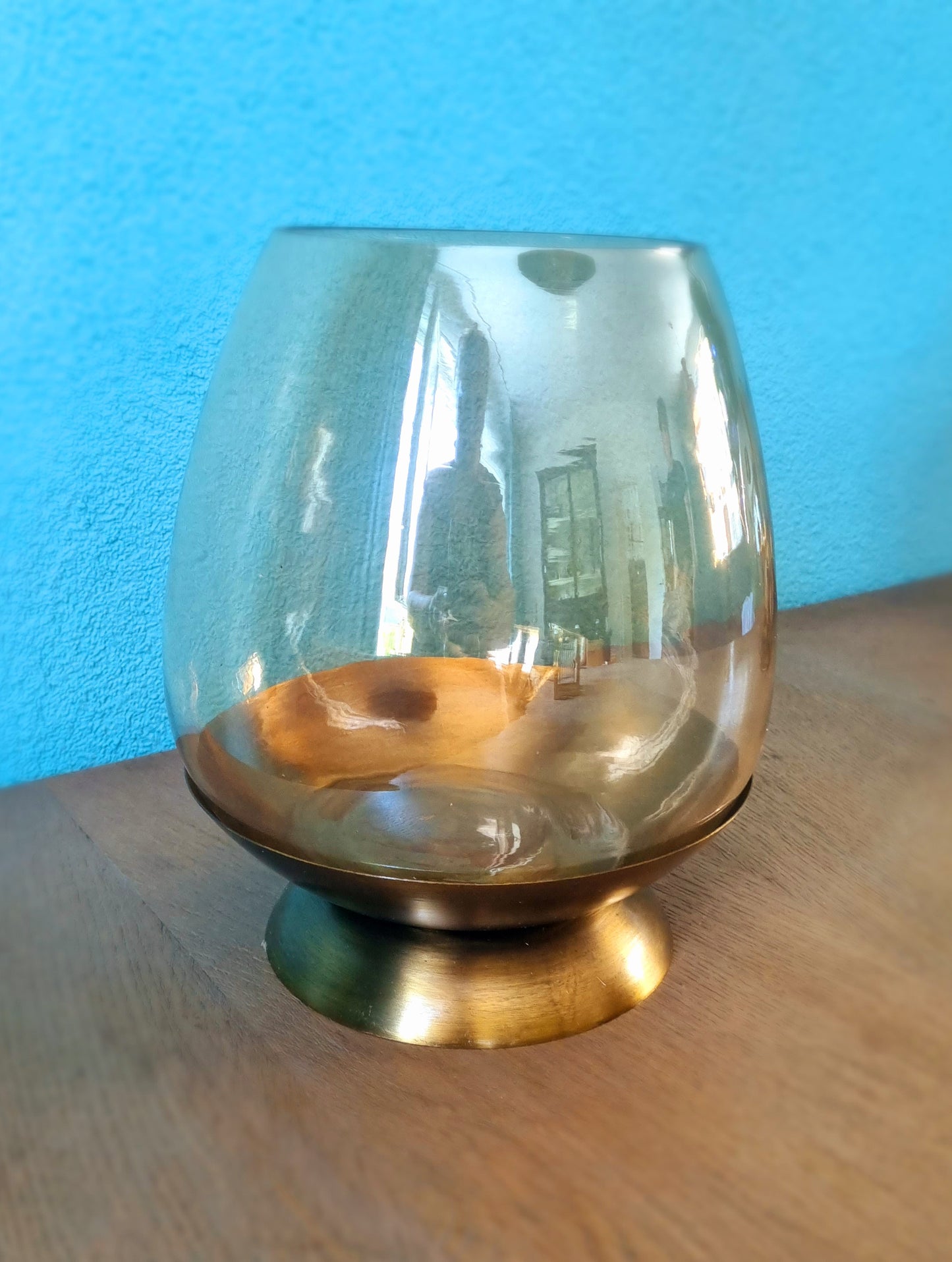 Lantern made of glass on a gold-coloured base 